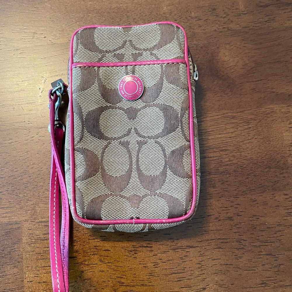 Hot pink and Coach logo wristlet